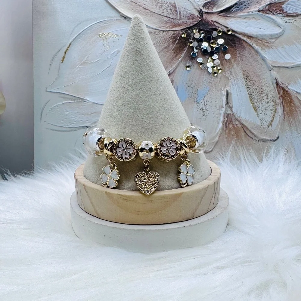The Heart of Charms: Flower & Heart Charms Bracelet